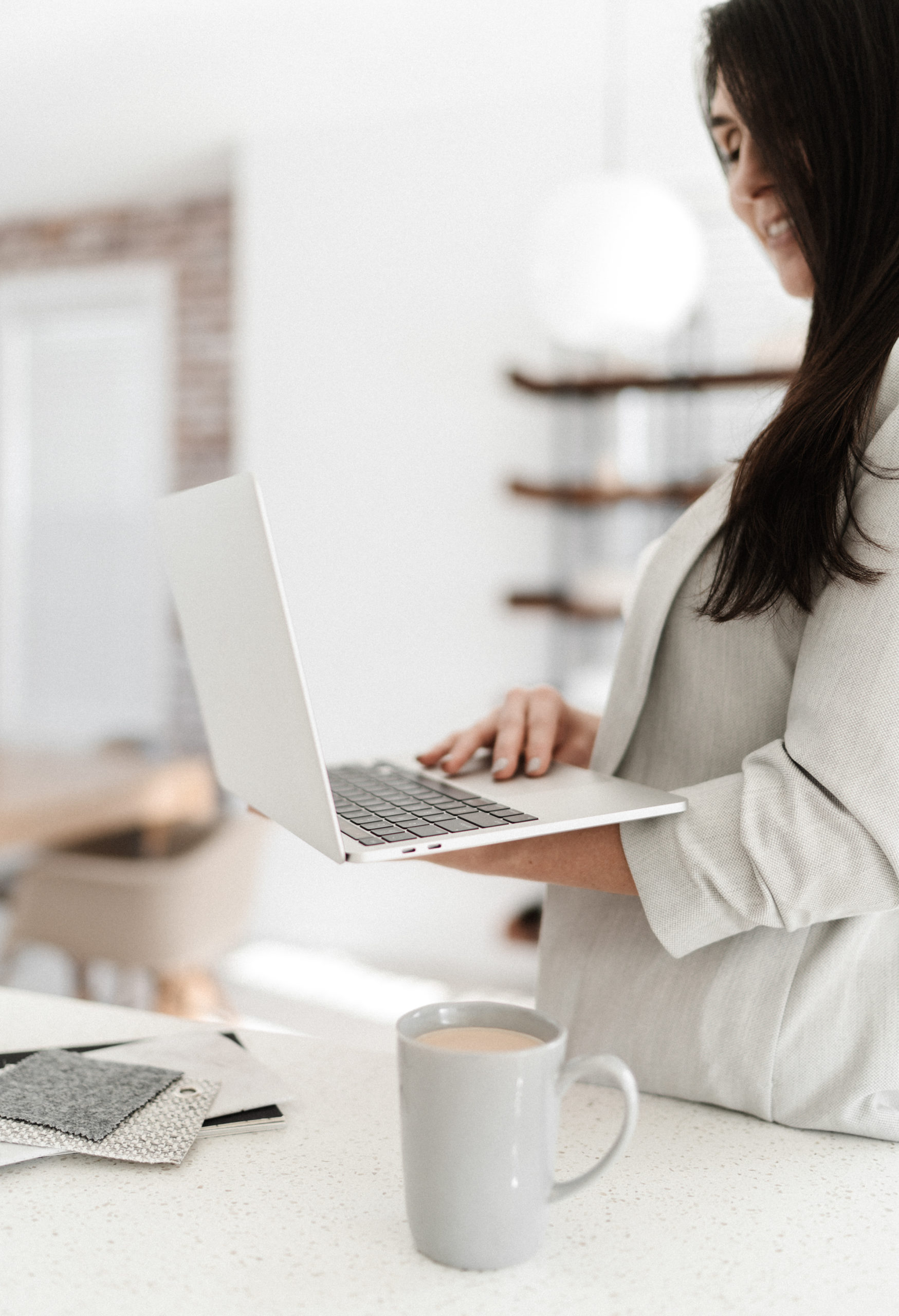 woman holding a laptop, minimalist